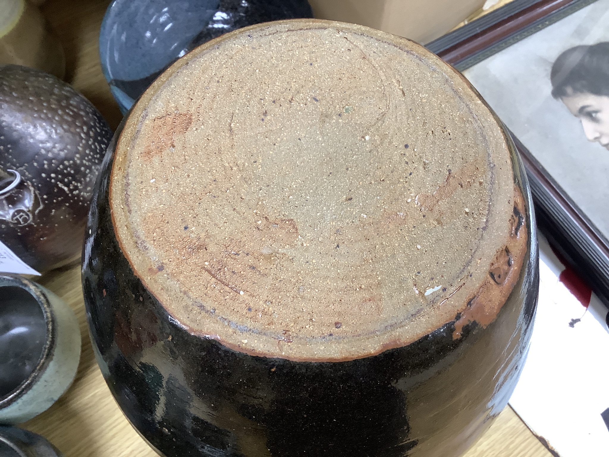 A collection of Studio pottery vases and a Bellarmine